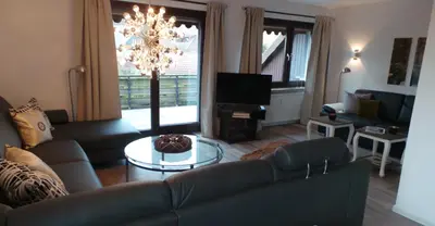 Ein Sitzbereich in der Unterkunft Ferienwohnung An der Jordanshöhe
