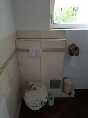 Ein Badezimmer in der Unterkunft Ferienhaus zum Vogelnest