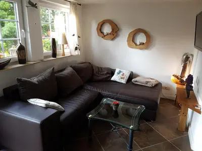 Ein Sitzbereich in der Unterkunft Ferienhaus zum Vogelnest