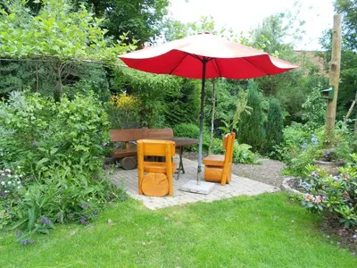 Ein Garten an der Unterkunft Ferienwohnung im Harz-Haus-Bruns
