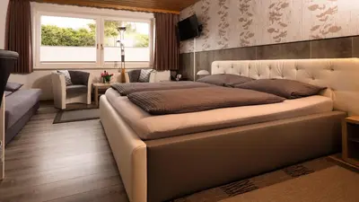 Ein Sitzbereich in der Unterkunft Hotel Brunnenbach