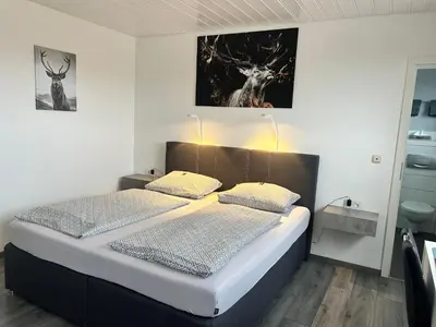 Ein Bett oder Betten in einem Zimmer der Unterkunft Hotel Brunnenbach