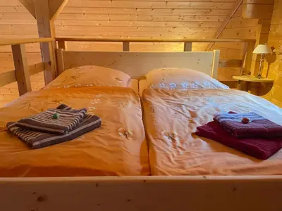 Ein Bett oder Betten in einem Zimmer der Unterkunft Ferienhaus Blick Hasserode