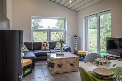 Ein Sitzbereich in der Unterkunft Ferienhaus Selke Am Bach