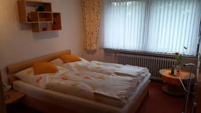 Ein Bett oder Betten in einem Zimmer der Unterkunft Haus am Sonnenhang