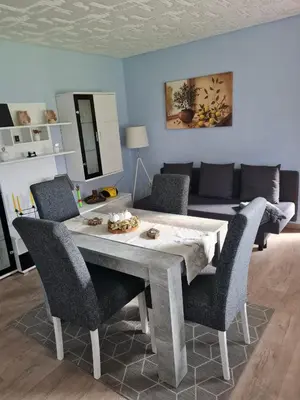 Ein Sitzbereich in der Unterkunft Haus am Waldesrand