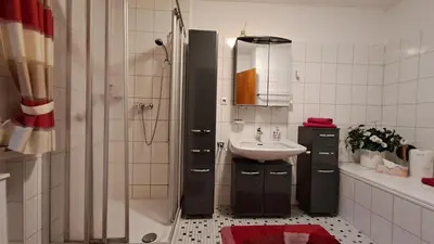 Ein Badezimmer in der Unterkunft Kurpark Domizil