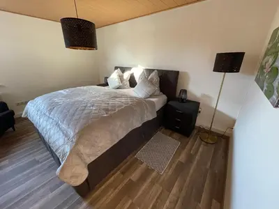 Ein Bett oder Betten in einem Zimmer der Unterkunft Unser Ferienhaus im Harz