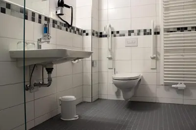 Ein Badezimmer in der Unterkunft Hotel garni Tilia