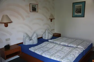 Ein Bett oder Betten in einem Zimmer der Unterkunft Wehrstedter Hof