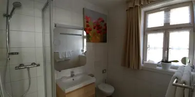 Ein Badezimmer in der Unterkunft Hotel Alte Brennerei