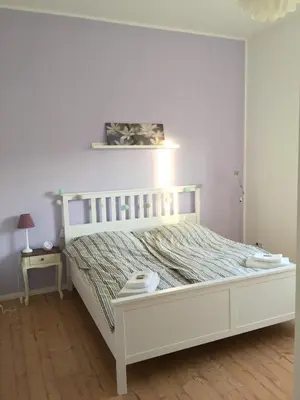 Ein Bett oder Betten in einem Zimmer der Unterkunft FeWo Gut Ohlhof