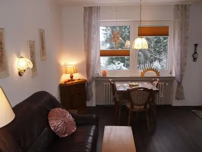 Ein Sitzbereich in der Unterkunft Ferienwohnung Schüler-Wolke 2