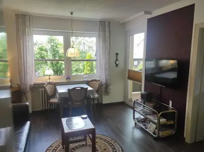 Ein Sitzbereich in der Unterkunft Ferienwohnung Schüler-Wolke 2