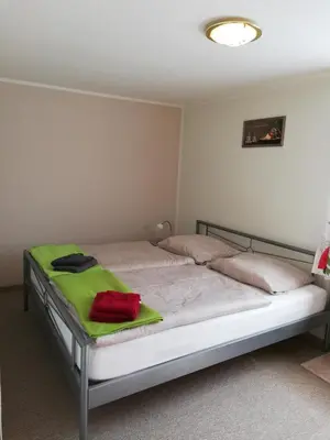 Ein Bett oder Betten in einem Zimmer der Unterkunft Ferienhaus Waldglück