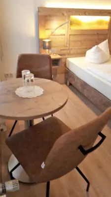 Ein Bett oder Betten in einem Zimmer der Unterkunft Gasthaus Brockenhėxe mit Restaurant & Café