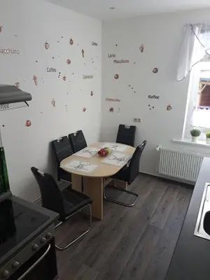 Ein Sitzbereich in der Unterkunft Zur Alten Oberförsterei