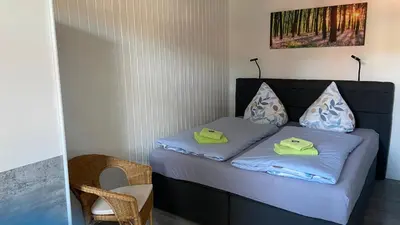 Ein Bett oder Betten in einem Zimmer der Unterkunft Harzer Ferienlodge