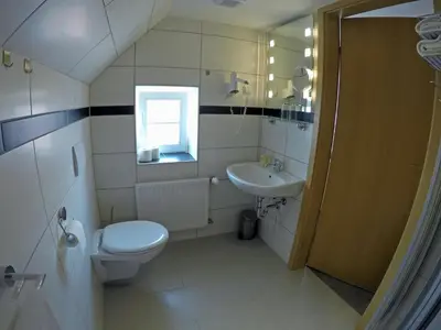 Ein Badezimmer in der Unterkunft Hotel Kaiserhof