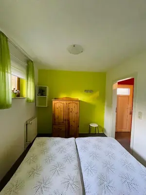 Ein Bett oder Betten in einem Zimmer der Unterkunft FEWO Brockenblick
