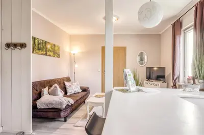 Ein Sitzbereich in der Unterkunft Ferienwohnung Ziesing Friedrichsbrunn