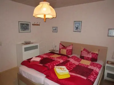 Ein Bett oder Betten in einem Zimmer der Unterkunft Haus Kummeleck , Wohnung 3