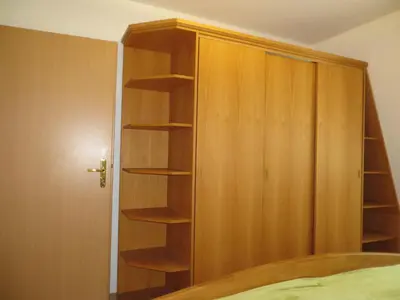 Ein Bett oder Betten in einem Zimmer der Unterkunft Weißes Haus am Kurpark, Fewo Waldblick