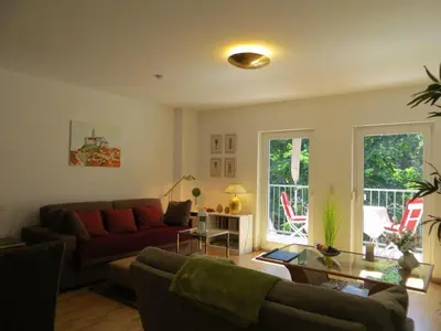 Ein Sitzbereich in der Unterkunft Weißes Haus am Kurpark, Fewo Waldblick