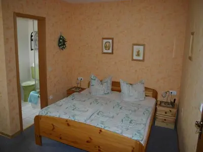 Ein Bett oder Betten in einem Zimmer der Unterkunft Haus Kummeleck, Wohnung 4