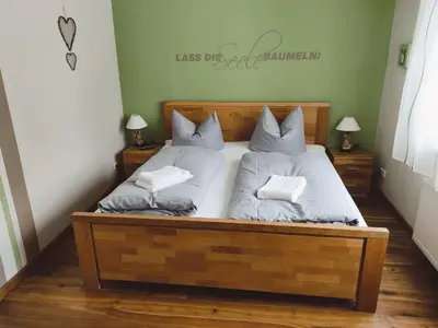 Ein Bett oder Betten in einem Zimmer der Unterkunft Ferienwohnung 