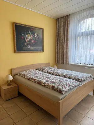 Ein Bett oder Betten in einem Zimmer der Unterkunft Villa Borchert