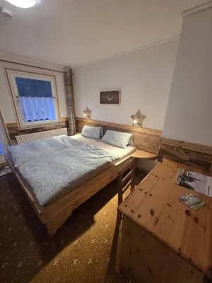 Ein Bett oder Betten in einem Zimmer der Unterkunft Wald-Landhaus