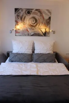 Ein Bett oder Betten in einem Zimmer der Unterkunft Bergblüte