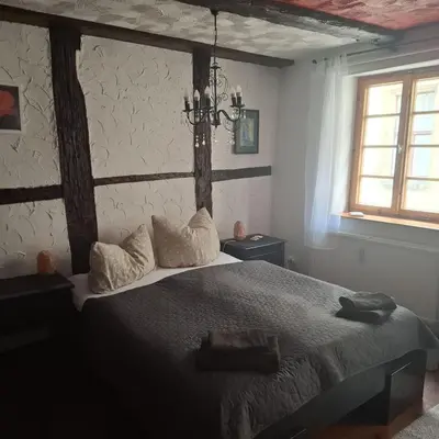 Ein Bett oder Betten in einem Zimmer der Unterkunft Kleine Auszeit am Rathaus
