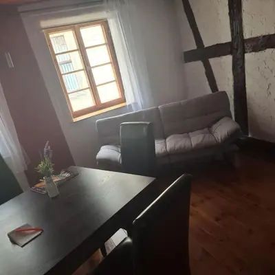 Ein Sitzbereich in der Unterkunft Kleine Auszeit am Rathaus