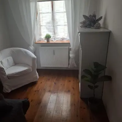 Ein Sitzbereich in der Unterkunft Kleine Auszeit am Rathaus
