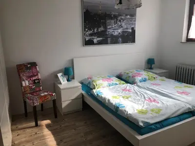 Ein Bett oder Betten in einem Zimmer der Unterkunft Ferienwohnung Liebing