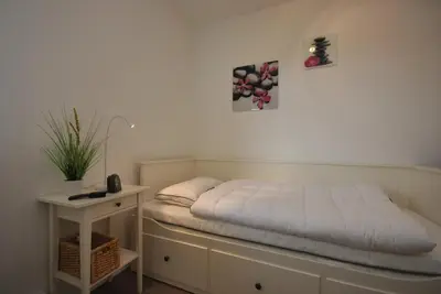 Ein Bett oder Betten in einem Zimmer der Unterkunft FeWo Altenau