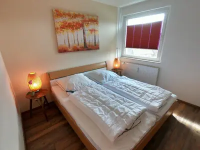 Ein Bett oder Betten in einem Zimmer der Unterkunft FeWo Altenau