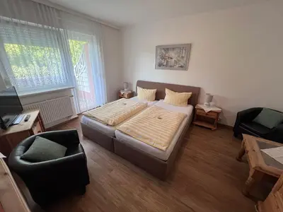 Ein Bett oder Betten in einem Zimmer der Unterkunft Haus Wiesengrund