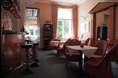 Ein Sitzbereich in der Unterkunft Hotel Schlossvilla Derenburg