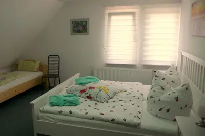 Ein Bett oder Betten in einem Zimmer der Unterkunft Ferienhaus 