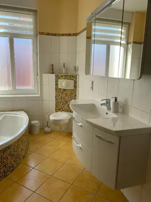 Ein Badezimmer in der Unterkunft Ferienwohnung am Bodetal mit Wallbox für E-Auto