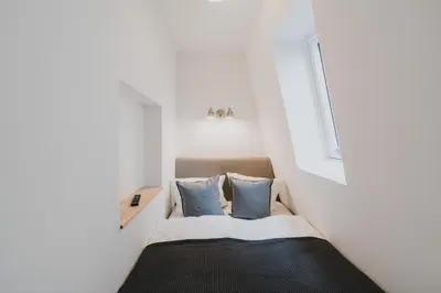 Ein Bett oder Betten in einem Zimmer der Unterkunft HarzLodge Emma