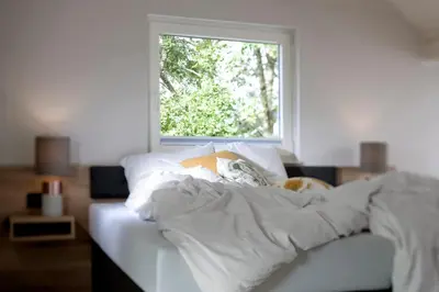 Ein Bett oder Betten in einem Zimmer der Unterkunft Berg und Tal Hotel & Apartments