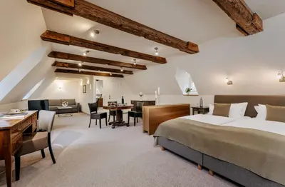 Ein Bett oder Betten in einem Zimmer der Unterkunft Romantik Hotel Alte Münze