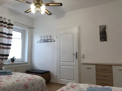 Ein Bett oder Betten in einem Zimmer der Unterkunft Ferienwohnung mit Brockenblick