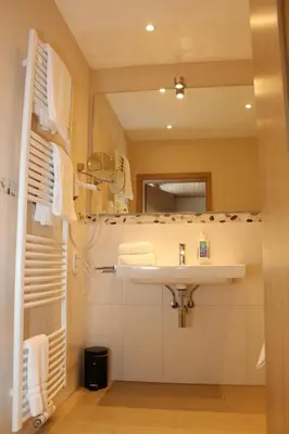 Ein Badezimmer in der Unterkunft Plumbohms ECHT-HARZ-HOTEL