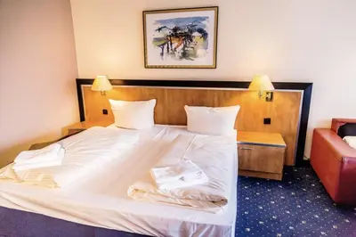 Ein Bett oder Betten in einem Zimmer der Unterkunft Apartment Seeblick am Bocksberg - Hahnenklee 