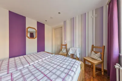 Ein Bett oder Betten in einem Zimmer der Unterkunft Ferienhaus Wichtelhus